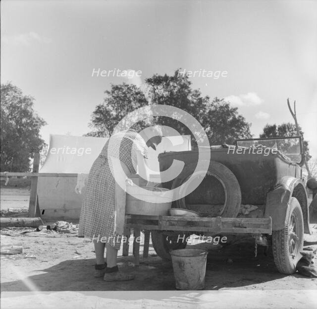 Blue Monday in a California migratory camp, 1936. Creator: Dorothea Lange.
