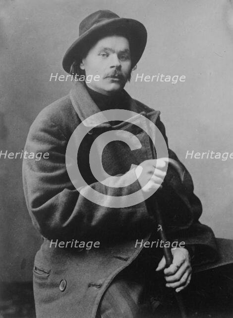 Maxim Gorky, seated with heavy coat on, 1910. Creator: Bain News Service.