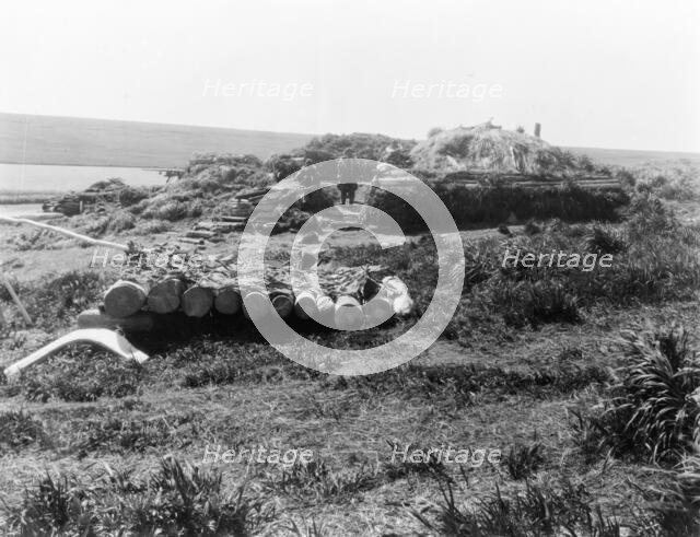 Nihkoyak, men's house at winter camp-Nunivak, c1929. Creator: Edward Sheriff Curtis.
