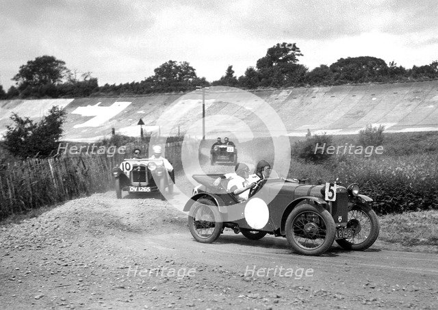 Two Austin Ulsters leading an MG, JCC Members Day, Brooklands, 4 July 1931. Artist: Bill Brunell.