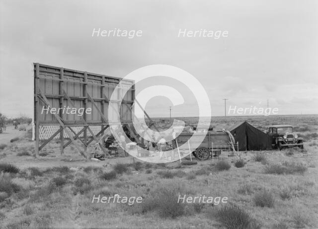 Three families camped on the plains along US99 in California, 1938. Creator: Dorothea Lange.