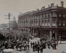 South Africa: a crowd of people gathered outside The Goldfields offices in Johannesburg, 1896. Creator: Unknown.