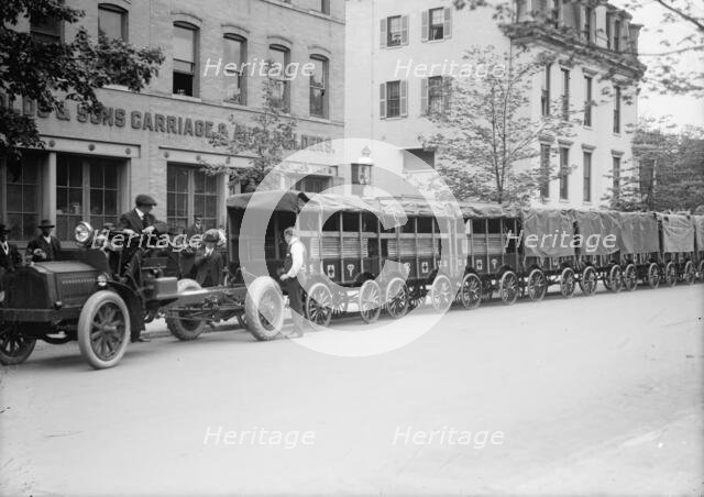 Red Cross, American - Army Trucks And Trailers For Red Cross Supplies, 1917. Creator: Harris & Ewing.