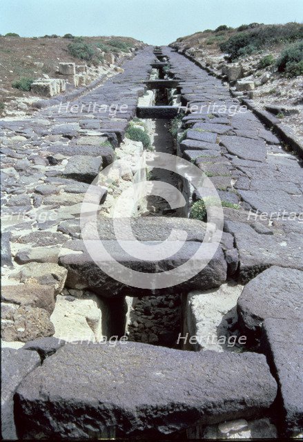 Cardus Maximus Street with underground conduction of water, in the Phoenician-Punic-Roman city of…