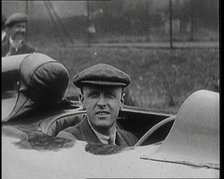 Sir Henry Segrave AKA Major Segrave's Climbing Into 'Sunbeam' Watched By a Crowd of Civilians, 1927. Creator: British Pathe Ltd.