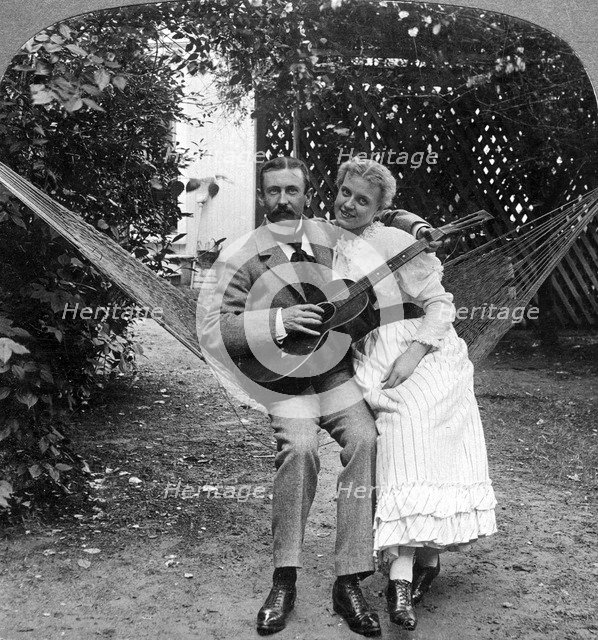 'The Musical Pair in the Hammock'.Artist: American Stereoscopic Company