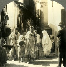 'Turbaned Men and Veiled Women Crowd this Narrow Street in the Arab Quarter of Algiers Algeria', c19 Creator: Unknown.