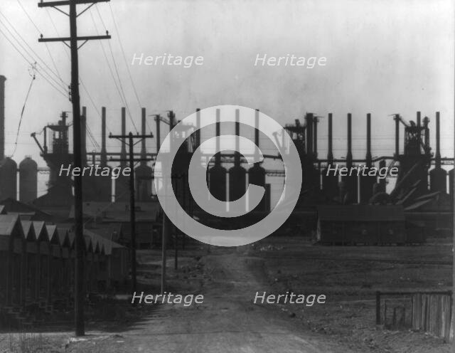 Steelmill and workers' houses, Birmingham, Alabama, 1936. Creator: Walker Evans.