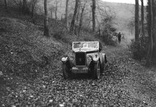 W Wright's Morris Minor with body by Arrow competing in the Inter-Varsity Trial, November 1931. Artist: Bill Brunell.