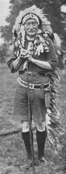 'Sir Robert Baden-Powell, arrayed in the dress of a Red Indian tribe', c1925. Creator: Unknown.