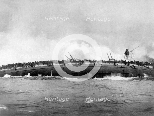 The german armoured cruiser SMS Blücher sinks after receiving multiple hits from British warships at Artist: Anonymous  