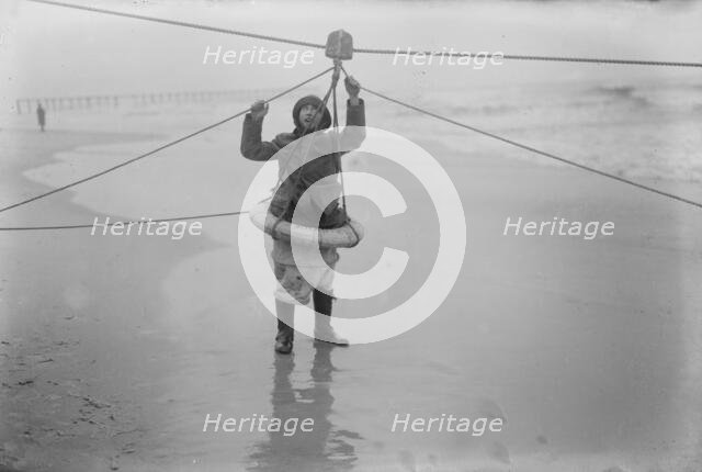 Man demonstrating ship rescue apparatus, 1919. Creator: Bain News Service.
