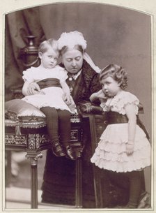 Queen Victoria with two of her grandchildren, April 1886. Artist: Alexander Bassano