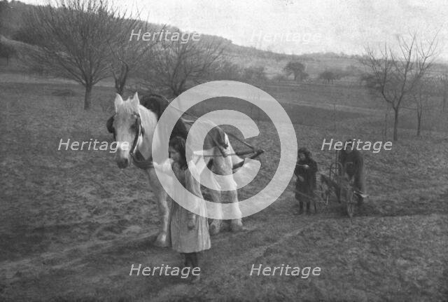 In the French countryside; While father is away fighting!, 1917. Creator: Unknown.