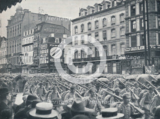 German Infantry entering Brussels in the rain, 1914. Artist: Unknown