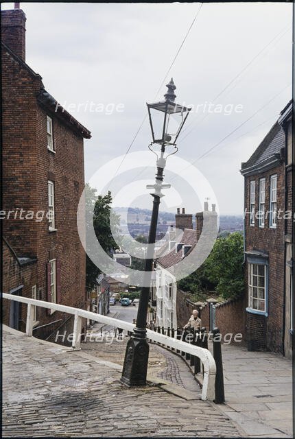 The leaning lamp post at the junction of Steep Hill and Danesgate, Lincoln, Lincolnshire, 1976 Creator: Dorothy Chapman.