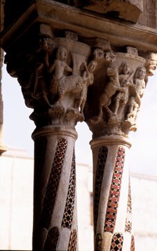 Detail of two capitals with carved figures with allegorical and religious decoration, and columns…