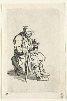 The Beggars: Beggar Sitting Down and Eating, c. 1623. Creator: Jacques Callot (French, 1592-1635).