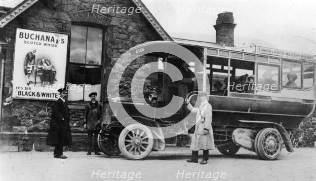 1910 Commer bus at Llanberis station, North Wales. Creator: Unknown.