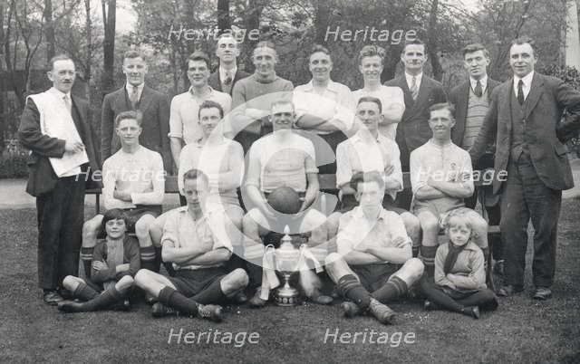 Rowntree football team pose with cup, 1929. Artist: Unknown