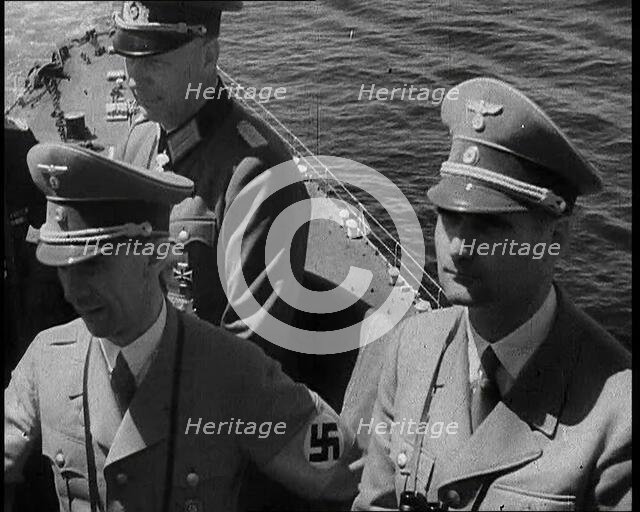 Dr Josef Goebbels, Rudolf Hess, and German Officer on Board an Italian Battleship, 1937. Creator: British Pathe Ltd.