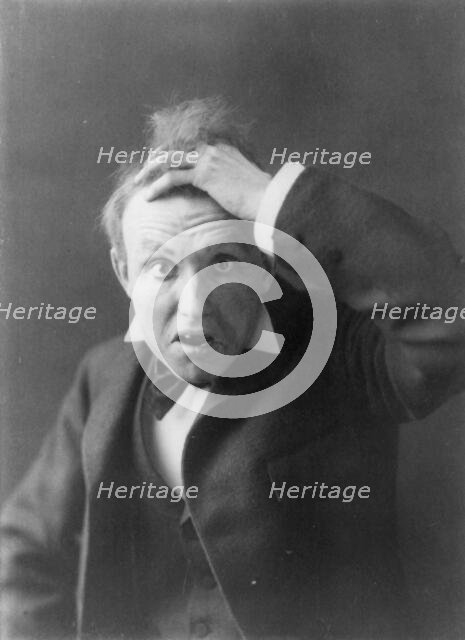 Mills Thompson, head-and-shoulders portrait, facing front, posed as toothless..., c1890 to c1910. Creator: Frances Benjamin Johnston.