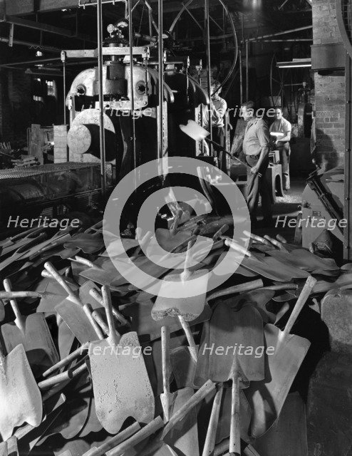 Rolling spade blades, Everlast Tools, Sheffield, South Yorkshire, 1965.  Artist: Michael Walters