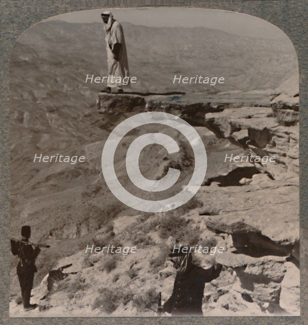 'The Arno. Dragoman standing on rock', c1900. Artist: Unknown.