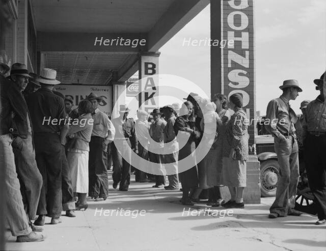 Waiting for the relief checks at Calipatria, California, 1937. Creator: Dorothea Lange.