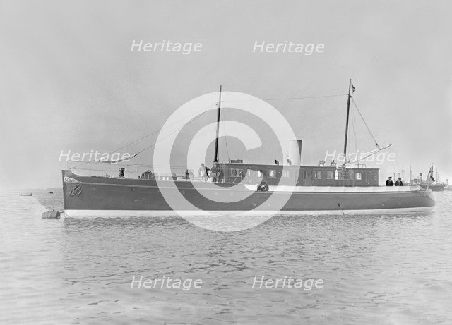 The 65 ton motor yacht 'Mairi' at anchor, 1921. Creator: Kirk & Sons of Cowes.