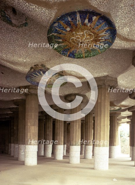 Detail of the roof of the forest of columns that support the great square of Guell Park, designed…