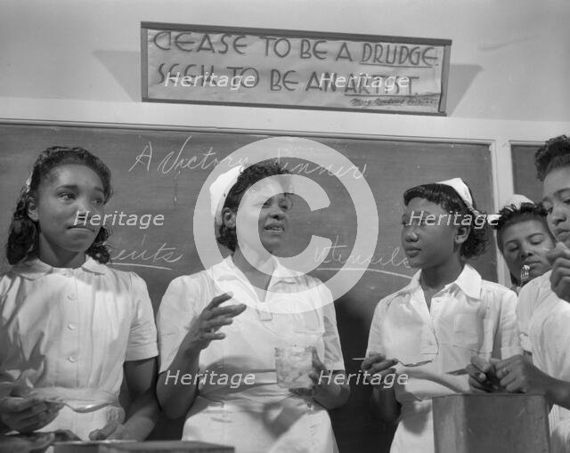 Students in the home economics class, Daytona Beach, Florida, 1943. Creator: Gordon Parks.