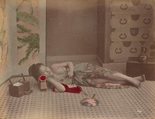 Woman Reclining with Pipe, 1870s-1890s. Creator: Kusakabe Kimbei.