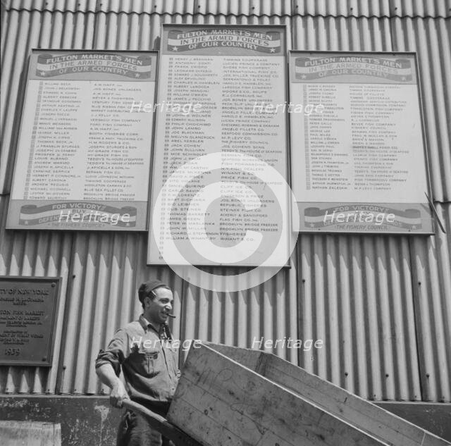 Many of the Fulton fish market men are in the armed forces, New York, 1943. Creator: Gordon Parks.