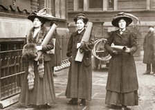 Suffragettes armed with materials to chain themselves to railings, 1909. Artist: Unknown