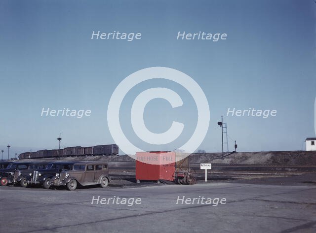 Train going over the hump at C & NW RR's Proviso yard, Chicago, Ill., 1942. Creator: Jack Delano.