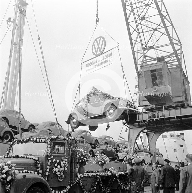 Imported Volkswagen Beetles arriving in Sweden, Landskrona harbour, 1961. Artist: Unknown