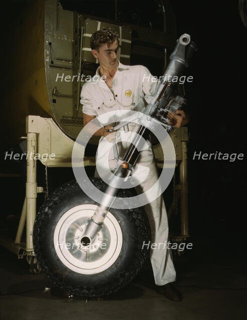 A nose wheel and landing gear assembly for a B-25..., North American Aviation, Inc., Calif., 1942. Creator: Alfred T Palmer.