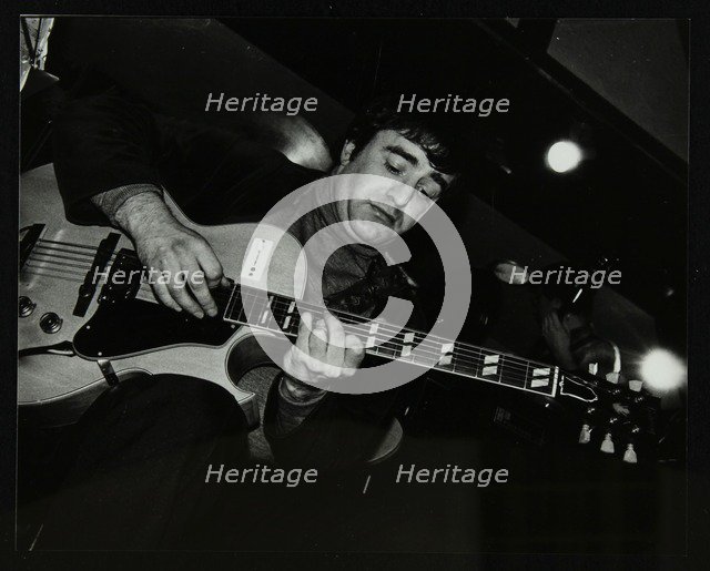 Esmond Selwyn playing the guitar at The Bell, Codicote, Hertfordshire, 22 February 1981. Artist: Denis Williams