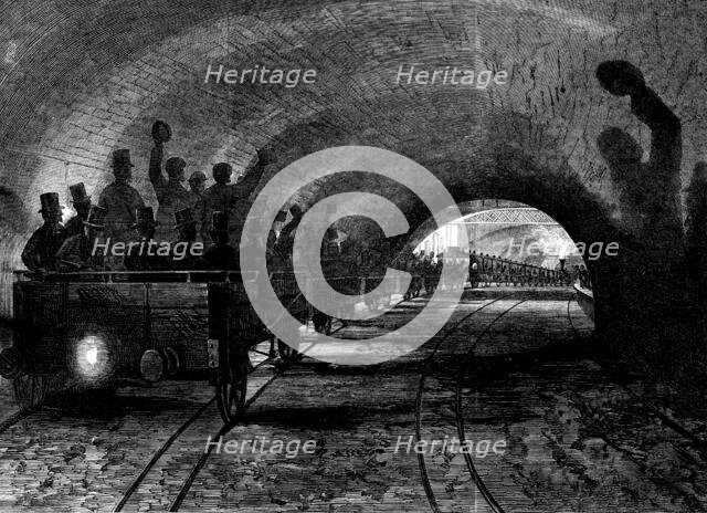 Trial-trip on the Metropolitan (underground) Railway: the train passing Portland-road station, 1862. Creator: Unknown.