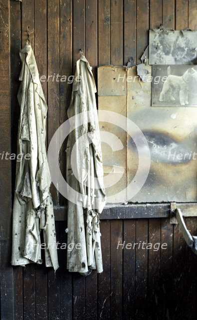 Overalls hanging up in JW Evans silversmiths factory, Birmingham, West Midlands, c1980-c2017. Artist: Historic England Staff Photographer.