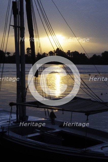 An anchored felucca on the River Nile at sunset. Artist: Unknown