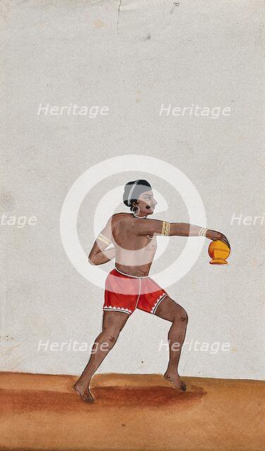 A street performer holding a small pot upside down, (between 1800 and 1899?). Creator: Unknown.