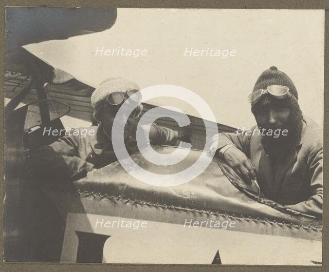 Two pilots in airplane, 1915-1930. Creator: Fédèle Azari.