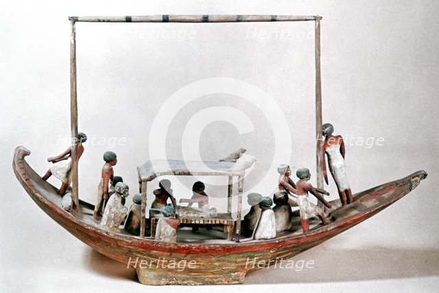 Ancient Egyptian model of a boat carrying a mummy to its tomb. Artist: Unknown