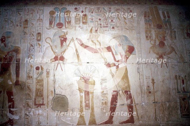 Painted relief of the Pharaoh before Thoth (Ibis-headed god), Temple of Sethos I, Egypt, c1280 BC. Artist: Unknown