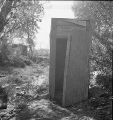 Privy in cotton camp for migratory workers, California, 1936. Creator: Dorothea Lange.