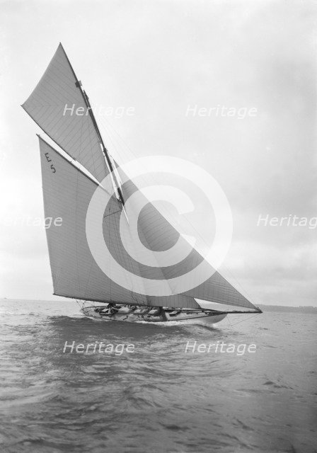 The 12 Metre yacht 'Javotte' sailng close-hauled, 1911. Creator: Kirk & Sons of Cowes.