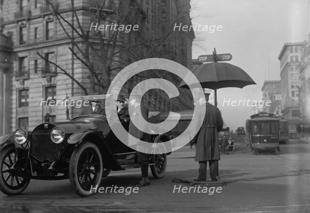 District of Columbia; Traffic. Stop And Go Signs, 1913. Creator: Harris & Ewing.