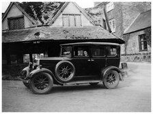 Woman in a vintage car, c1920s(?). Artist: Unknown